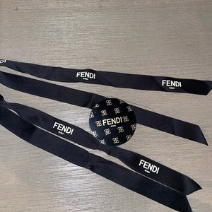 Fendi ribbons and magnetic bag tag